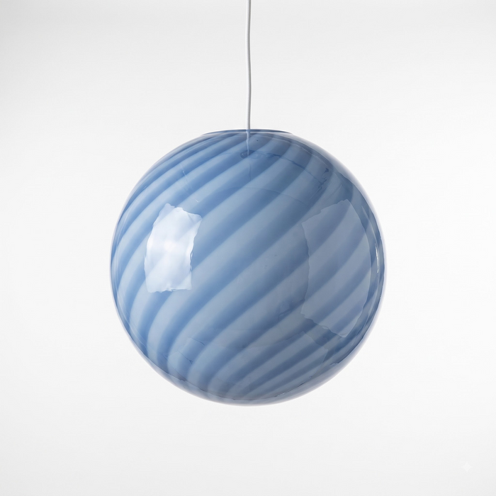 Glass globe pendant light on a white studio background – the blue swirl BO-HA Kaja, shown unlit.