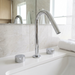 Kilde bathroom sink faucet in polished chrome on a white marble bathroom vanity